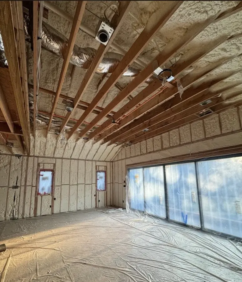 Interior walls and ceiling insulated with spray foam during new construction in Branson